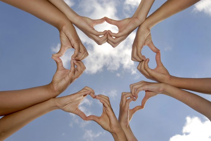 Hands,Together,Against,The,Sky